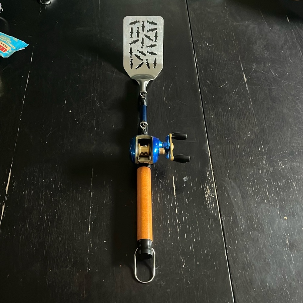 Fishing reel spatula. GUC.